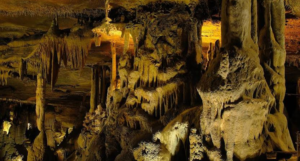 A cave with many different formations and lights